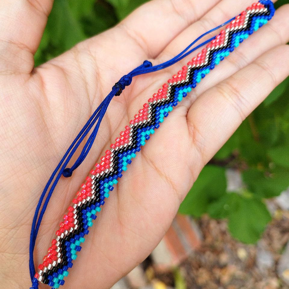 Manilla tejida azul y rojo