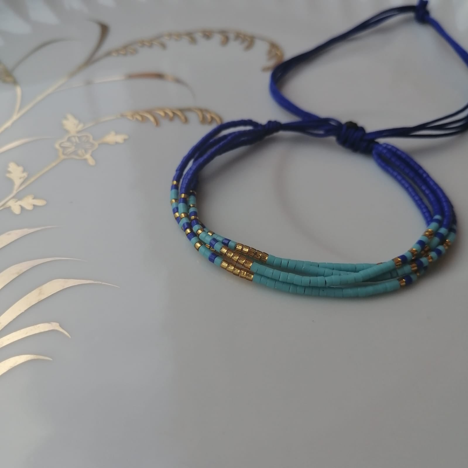 Pulsera 4 filas azul claro