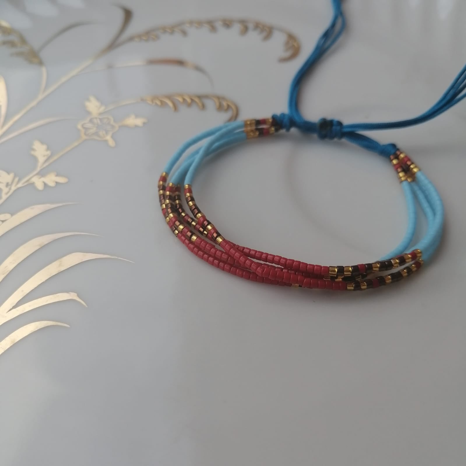 Pulsera 4 filas azul y roja