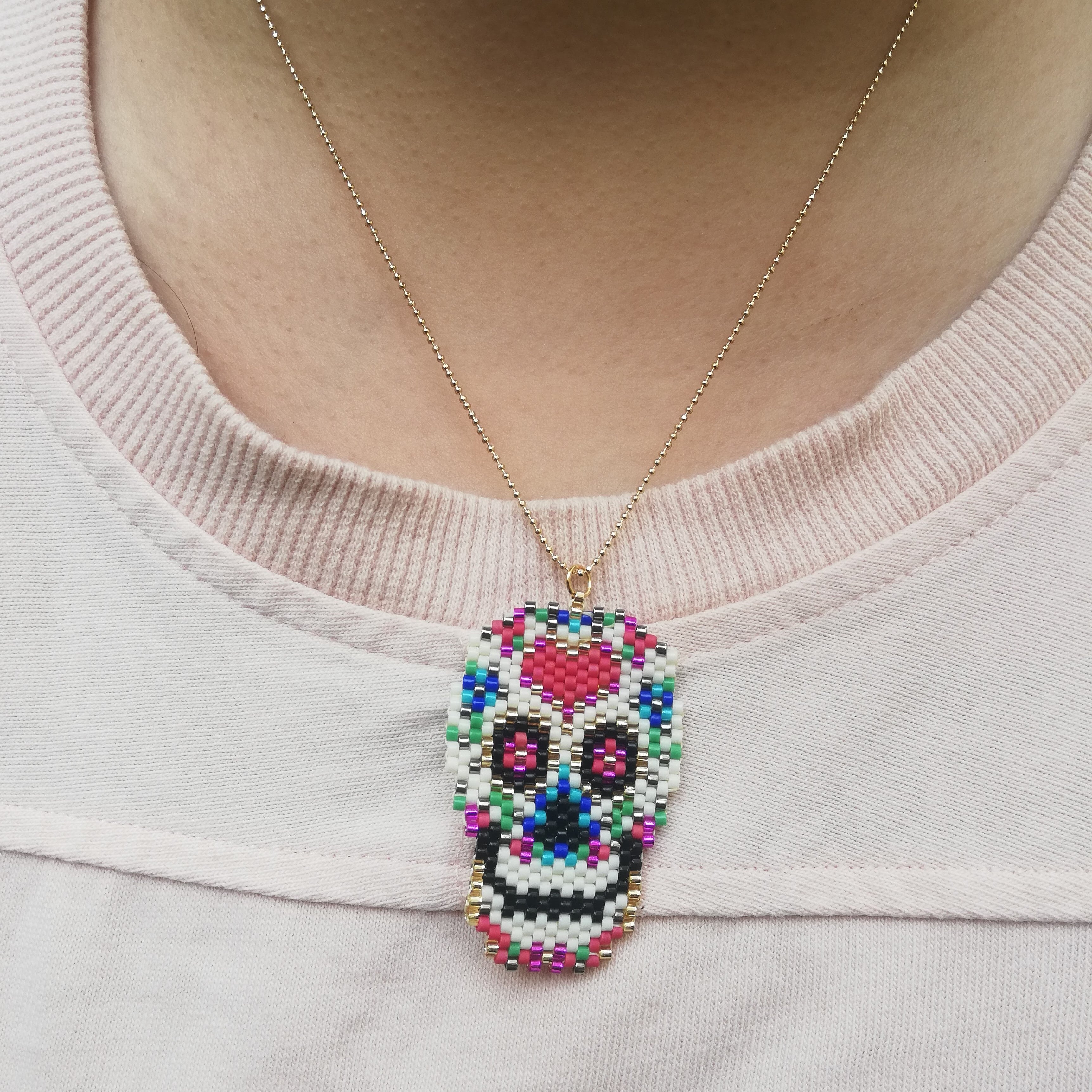Collar y/o aretes calavera