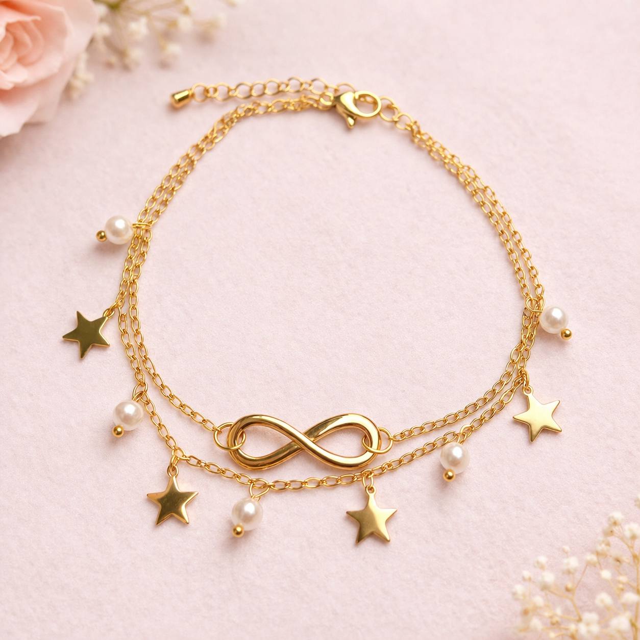 Tobillera Dorada infinito y estrellas