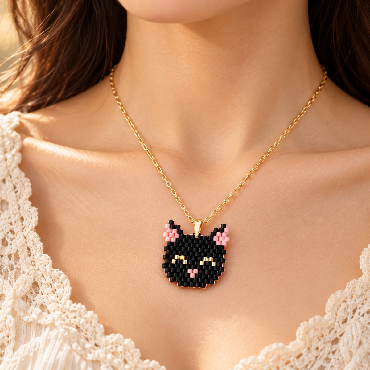 Collar y/o aretes gatos negros